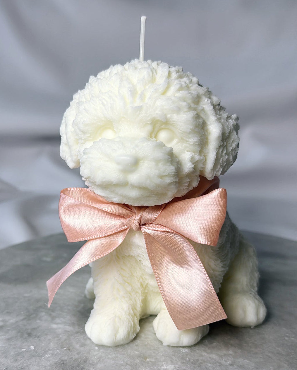 Large bow puppy candle